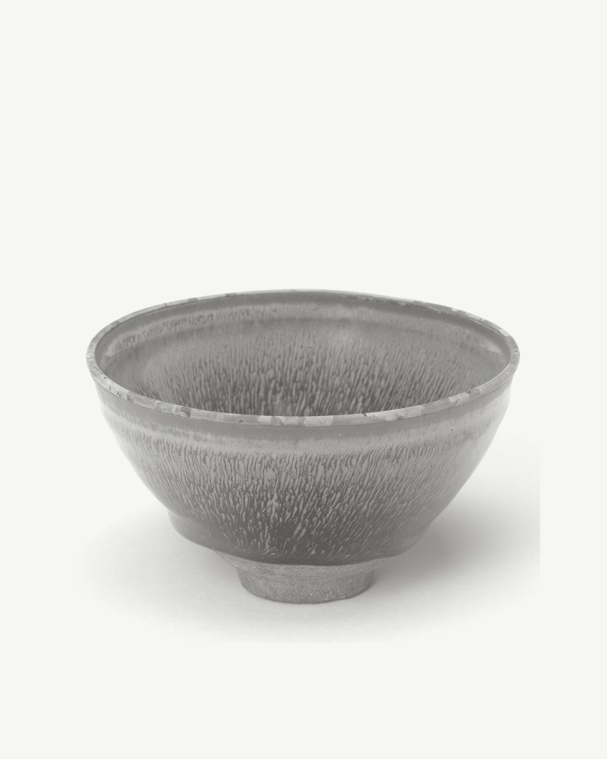 A conical stoneware tea bowl with a fine streaked glaze (sample listing, museum object)