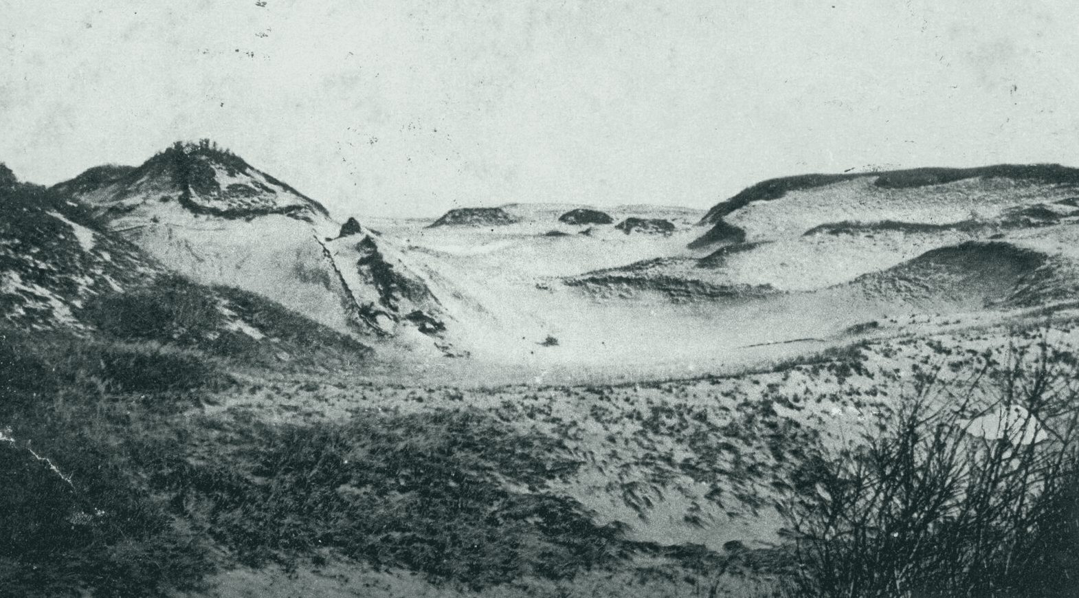 Sand dunes at Provincetown around 1900, beach grass on the slopes and a bare crest