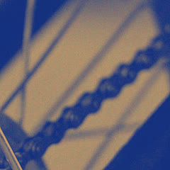 A bike chain running to the rear wheel