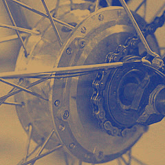 A rear hub with its spokes, sprocket and chain