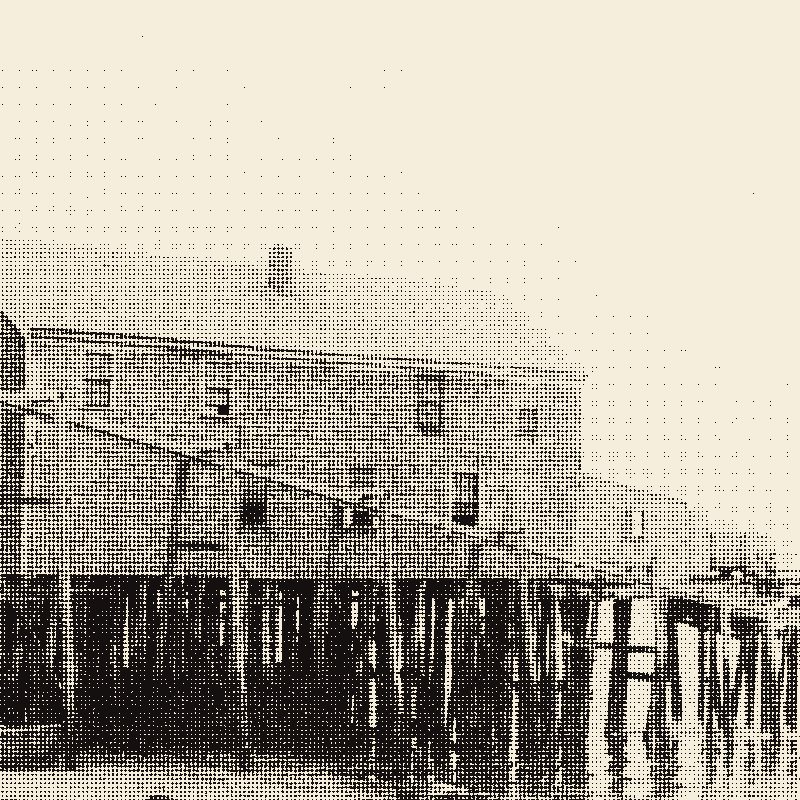 A shingled wharf building on pilings in Provincetown, photocopied