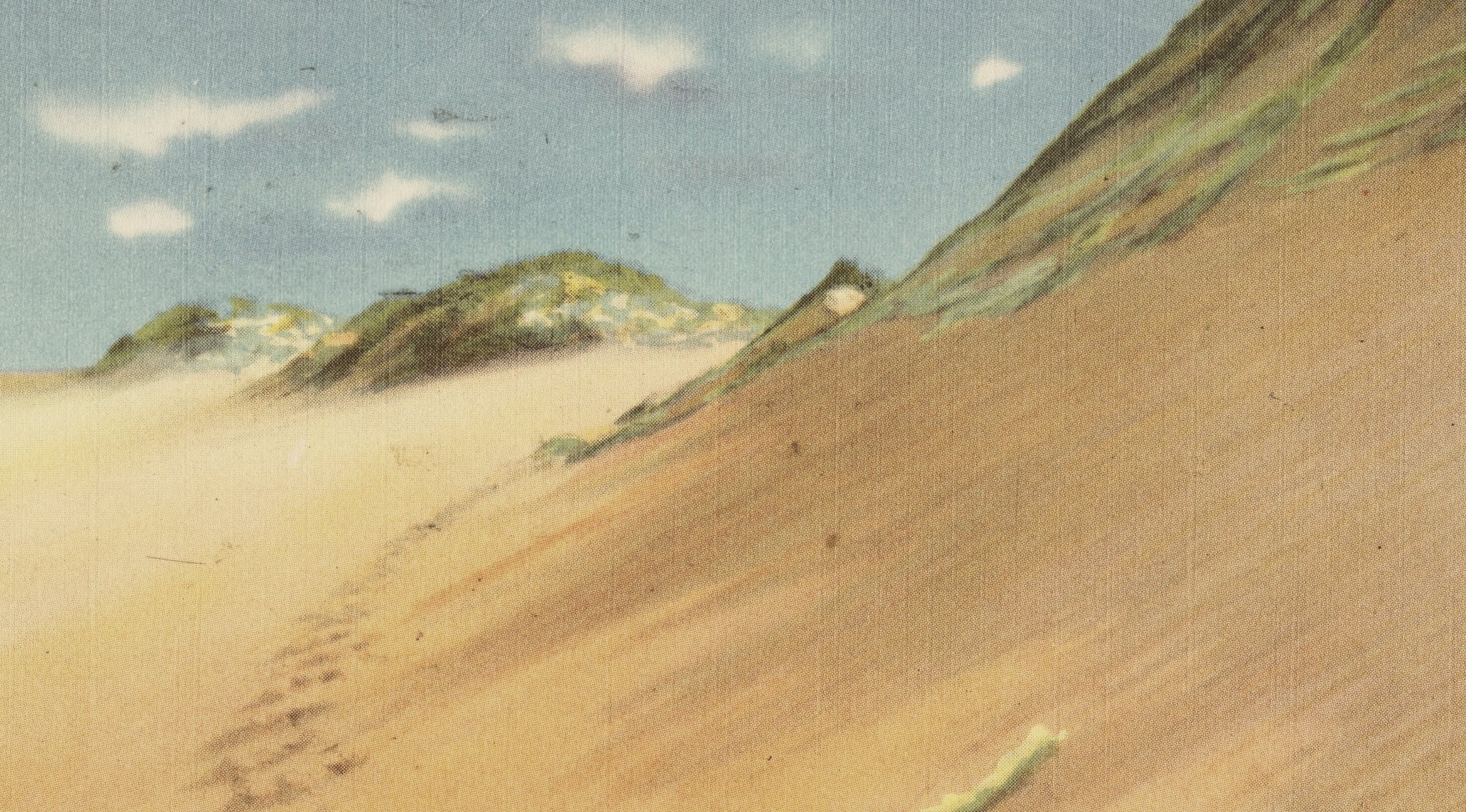 Hand-tinted postcard: footprints climbing a steep orange dune face toward a grassy ridge